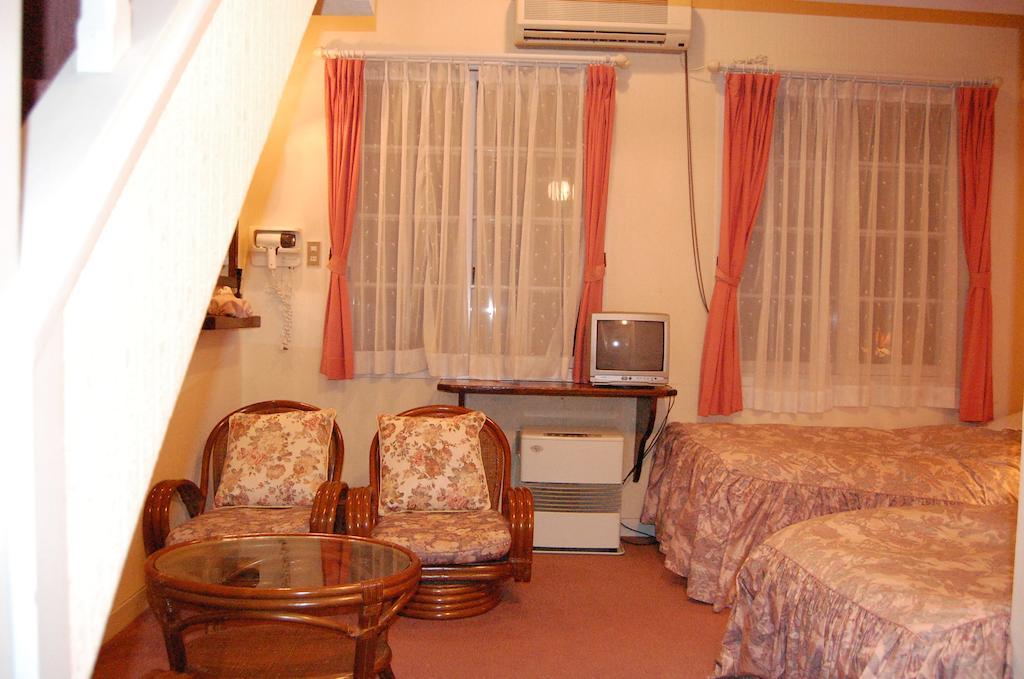 Petit Hotel And Restaurant Air Mail Хакуба-Мура Номер фото
